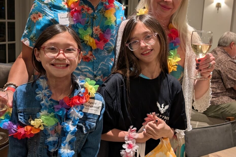 A family dressed up for cruise themed murder mystery party at Hyatt in San Antonio