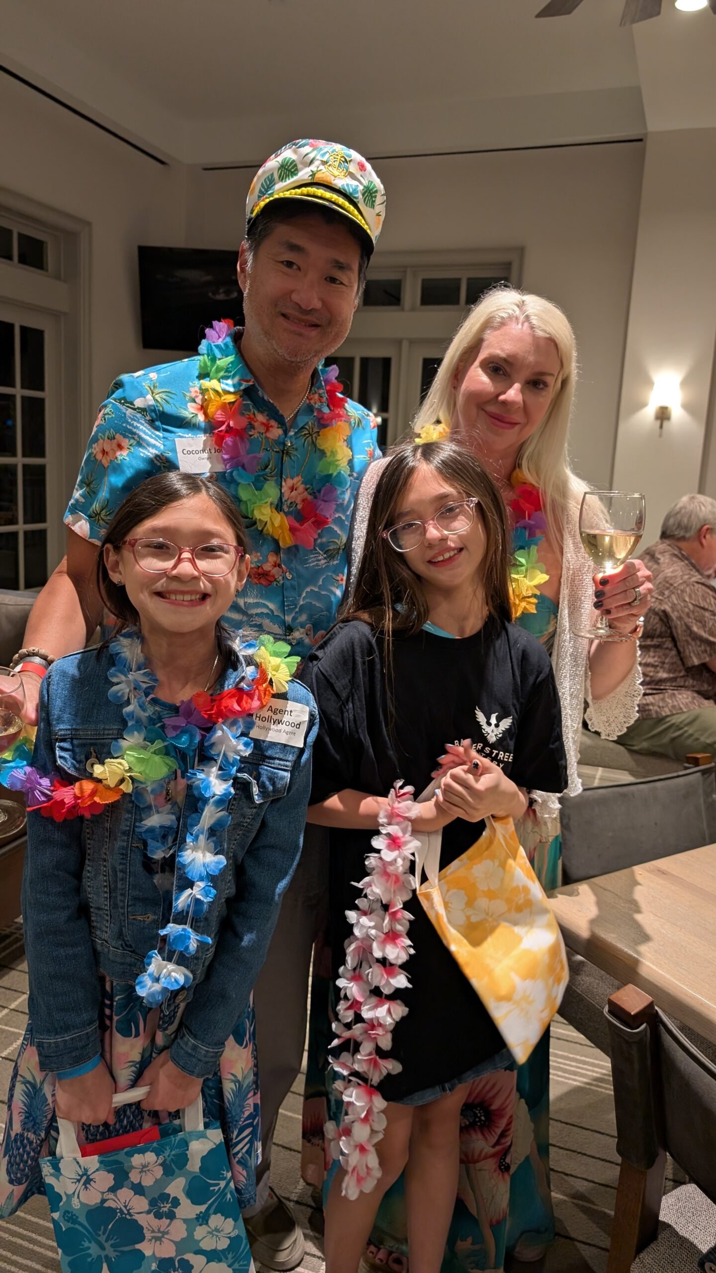 A family dressed up for cruise themed murder mystery party at Hyatt in San Antonio