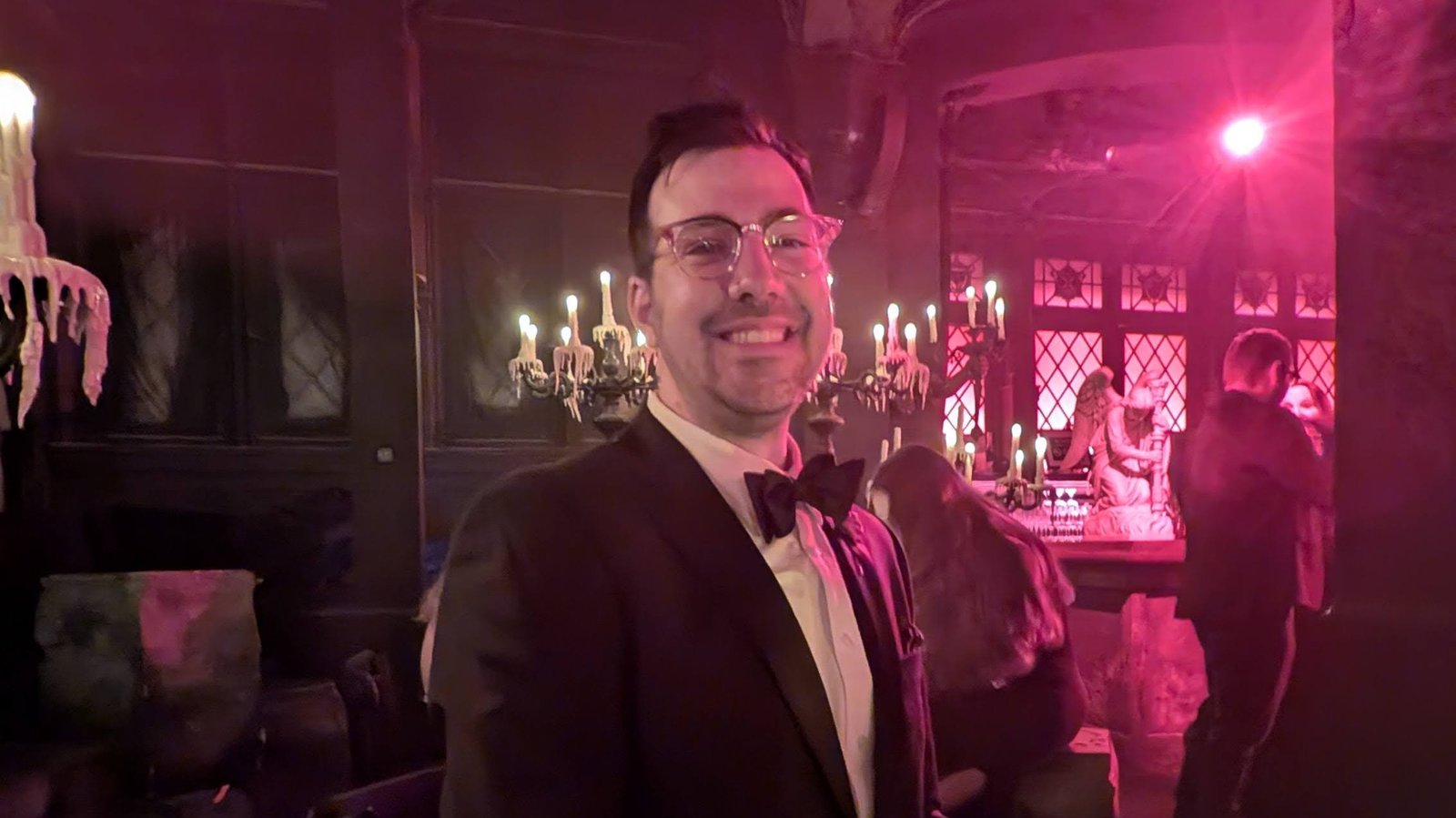 Owner of Baker Street Mystery sitting in the bar after the Masquerade NYC immersive Phantom of the Opera experience.